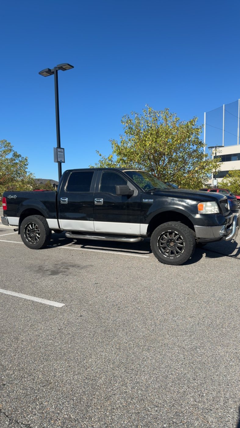 The actual black and silver Ford F-150 used by Second Chance Hauling Co.